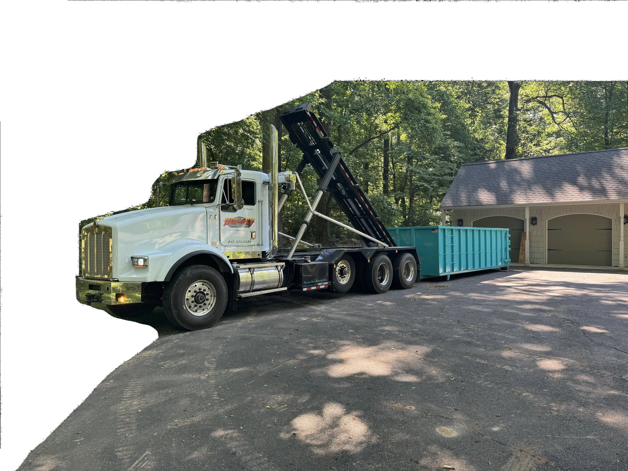 Holley rolloff truck delivering a dumpster
